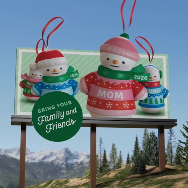 A still from a video featuring various Christmas ornaments coming to life on billboards as Santa drives past them in a convertible.